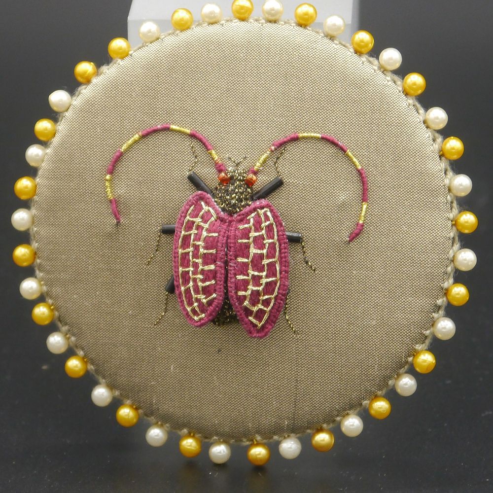 Image Description of "Ann Notley – pin holder with embroidered beetle".
